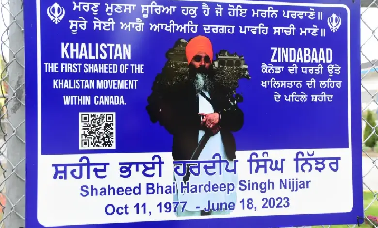 A poster of the former Gurdwara President Hardeep Singh Nijjar displayed on a fence outside the Guru Nanak Sikh Gurdwara temple in Surrey, British Columbia, Canada