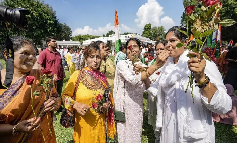 Women Congress supporters celebrate the Women’s Reservation Bill, at AICC Headquarters in New Delhi