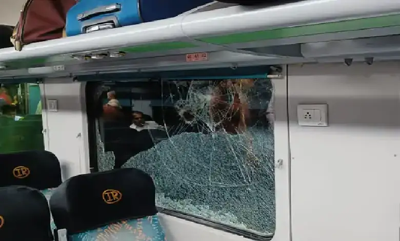 A photo of a Jaipur-Udaipur Intercity train with broken windows after being pelted with stones