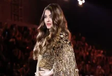 Aishwarya Rai Bachchan walks the ramp at Paris Fashion Week in a golden gown