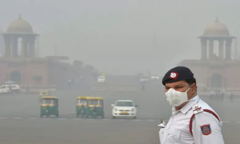 A photo of a polluted Delhi skyline, with the words "Delhi Air Pollution Odd-Even Formula" superimposed over it