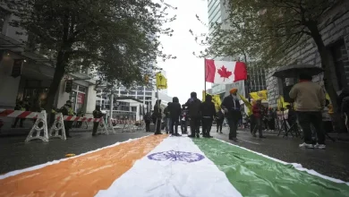 A photo of the Indian and Canadian flags side by side, with a question mark in between, to represent the diplomatic spat between the two countries