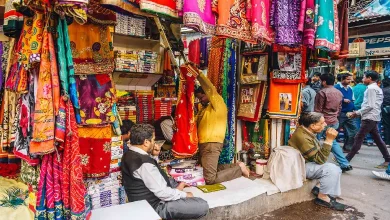 A woman shopping for Navratri clothes at a cheap market in Delhi