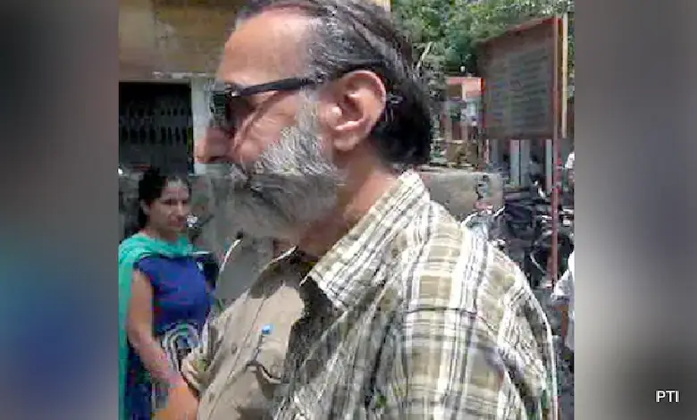 Moninder Singh Pandher, one of the accused in the Nithari serial killings case, walks out of jail after being acquitted by the Allahabad High Court