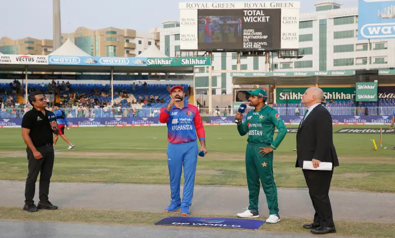 Pakistan cricket team captain Babar Azam and Afghanistan cricket team captain Mohammad Nabi at the toss for the T20 World Cup 2023 match between Pakistan and Afghanistan
