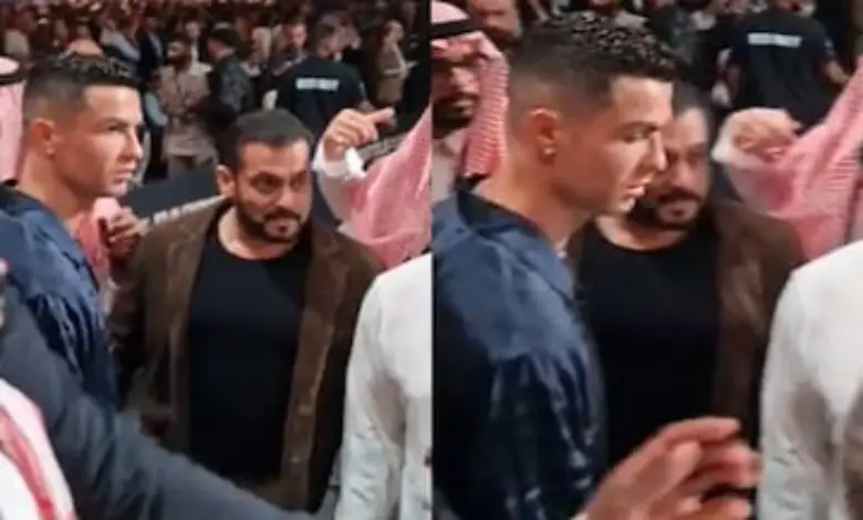 Salman Khan stands in the background as Cristiano Ronaldo hugs others at a boxing match.