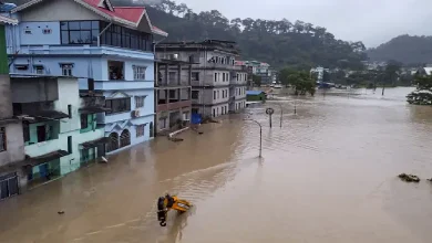 A photo of the Sikkim flash floods, with a caption that says "PM Modi's reaction revealed, search for missing soldiers continues