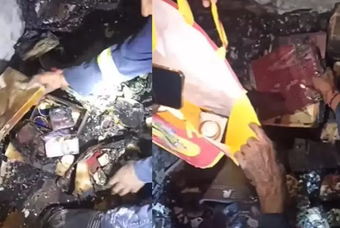 Ahmedabad Fire Brigade firefighters saving gold from a fire