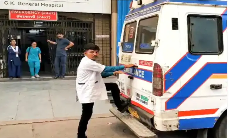 A patient is trapped inside an ambulance outside the Kachchh General Hospital in Bhuj, India