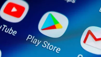 A person downloading an app from the Google Play Store on their smartphone.