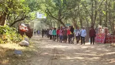 People receiving medical checkups at a medical camp in Girnar Green Circle