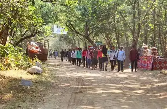People receiving medical checkups at a medical camp in Girnar Green Circle