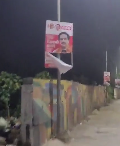 A torn banner of Uddhav Thackeray in Thane.