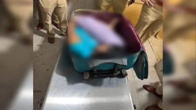 Mumbai police investigating a suitcase containing a woman's body