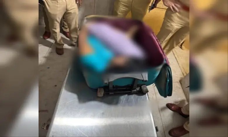 Mumbai police investigating a suitcase containing a woman's body