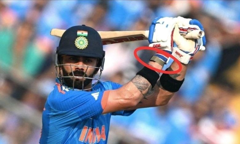 Virat Kohli with Special Band on Hand