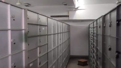Jaipur police raiding a locker and seizing cash and gold