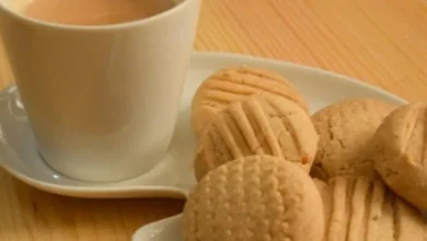 A doctor is prescribing tea-biscuits for a patient.