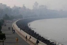 A cityscape of Mumbai with a smog cloud hanging over it, symbolizing the invisible disaster that threatens the city.