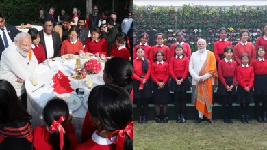 Prime Minister Modi interacting with children during their visit to his office, symbolizing government openness.