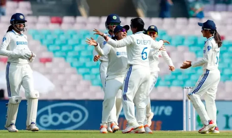 Jubilant Indian cricketers celebrate their historic 347-run victory over England in the Women's Test match.