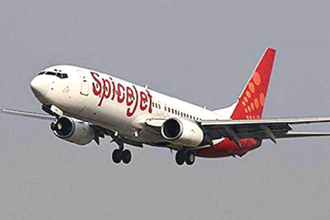 Plane safely touches down during emergency landing at Varanasi airport, passengers disembarking.