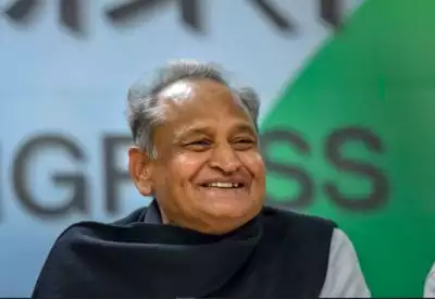 Ashok Gehlot laughing amidst political turmoil in Rajasthan, Congress vs BJP.