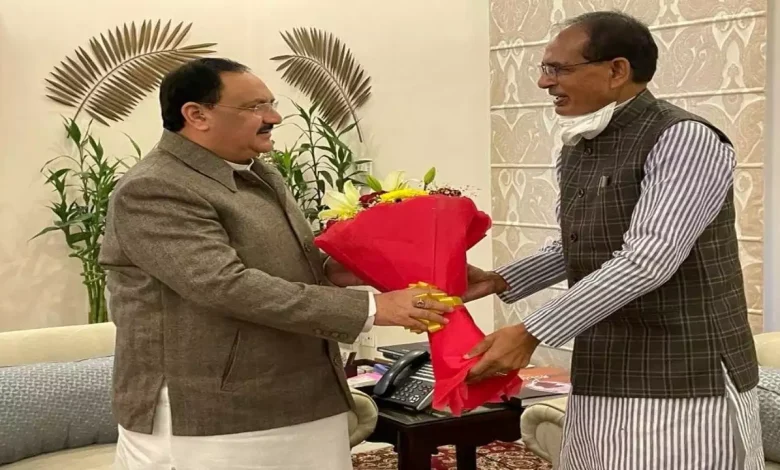 Shivraj Singh Chauhan shakes hands with BJP president JP Nadda in Delhi.