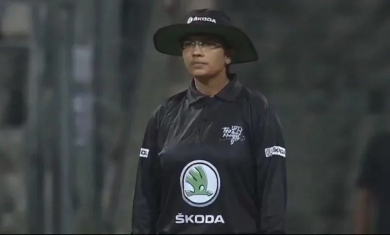 Vrinda Rathi, the first Indian woman to become a Test cricket umpire, raising her finger in a historic moment.