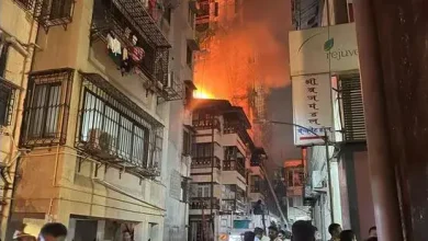 Ominous orange flames engulf a 4-storey building in Mumbai, casting an eerie glow on the night sky.