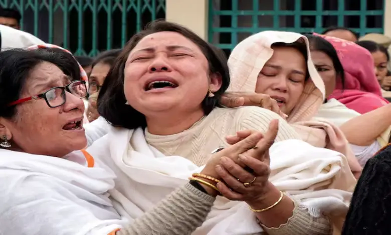 Family members break down as they arrive to claim the bodies of the 13 people who were killed after a gunfight in a border village of Manipur's Tengnoupal district on Monday, at JNIMS mortuary in Imphal. ( Image Source : PTI )