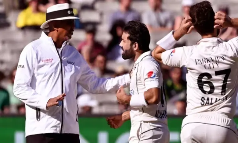 Mohammad Rizwan (C) and Agha Salman (R) argue with umpire Joel Wilson (L) after Rizwan's dismissal on the fourth day of the second Test