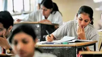 Students writing exams in separate phases as per new Gujarat board rules.