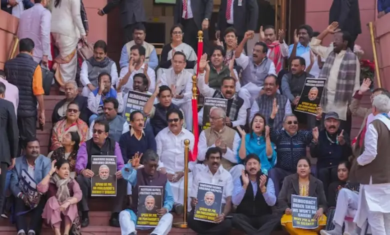 Suspended Opposition MPs protest during the Winter session of Parliament