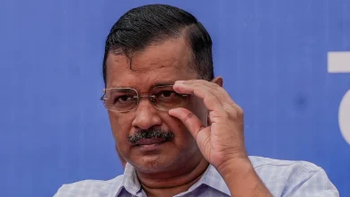 Kejriwal appears defiant amidst BJP's jail time threats over ED summons.