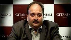 Image depicting Mehul Choksi in court, with the words "Bombay High Court" and "FEO Plea Rejected" superimposed.