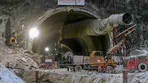 Construction equipment excavates rock inside the Silkyara tunnel, marking a cautious restart 38 days after the tragic collapse.