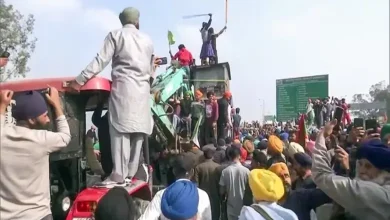 Protesting farmers bring heavy machinery, including hydraulic cranes and earthmovers, to Shambhu on the Punjab-Haryana border