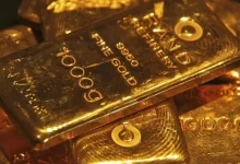 Gold prices dip in face of fewer rate cuts this year