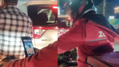 Zomato delivery boy seen studying UPSC on bike in heavy traffic