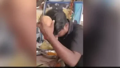 Man accidentally breaks coconut on head during puja, causing laughter