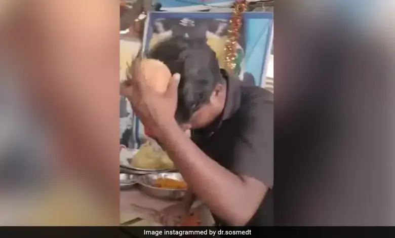 Man accidentally breaks coconut on head during puja, causing laughter