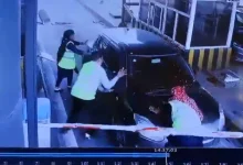 driver rams into woman standing plaza