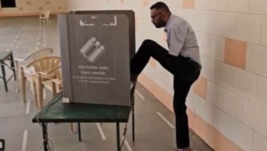 A disabled youth casts vote using foot and inspired other voters to vote
