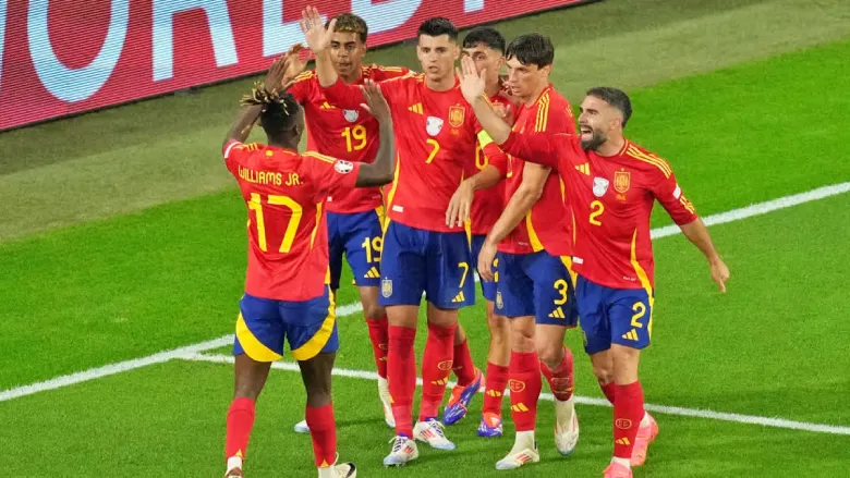 Spain shocked defending champions Italy to reach the knockout stages
