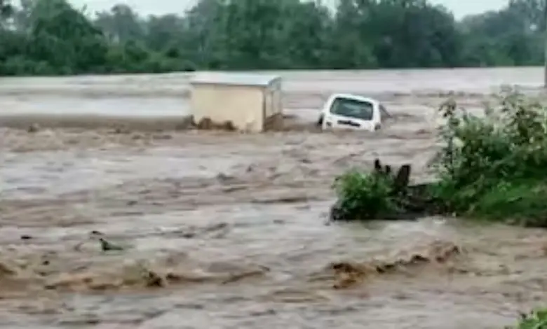 Cars and pan shop washed away in flash floods