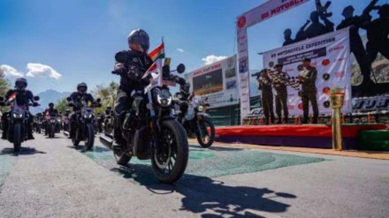 Indian Army officers march on motorcycles