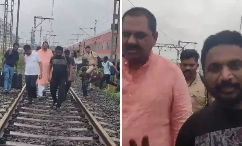 Maharashtra Minister and NCP MLC walk on railway tracks in Mumbai