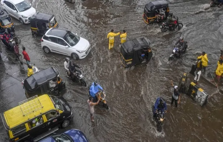 Heavy rain in Mumbai waterlogged roads orange alert issued