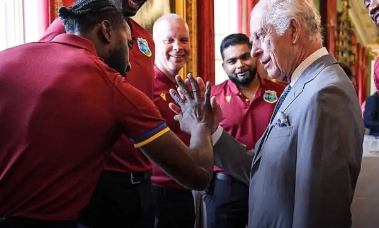 West Indies cricketers taught Prince Charles a new style of handshake...